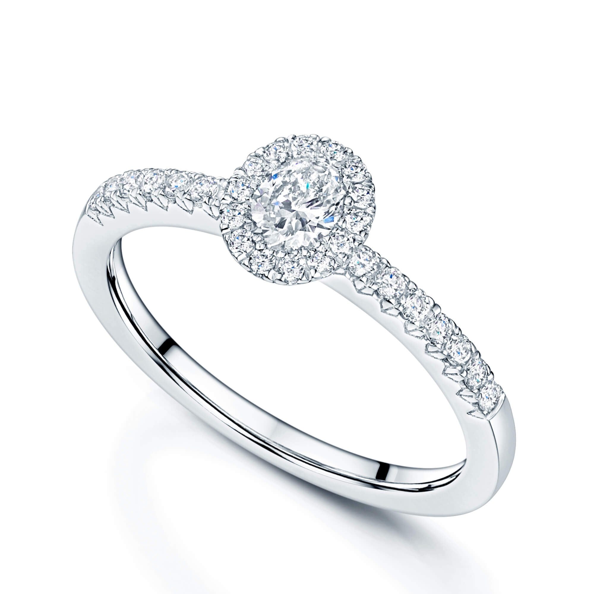 Platinum Oval Cut Diamond Ring With A Diamond Halo Surround And Shoulders