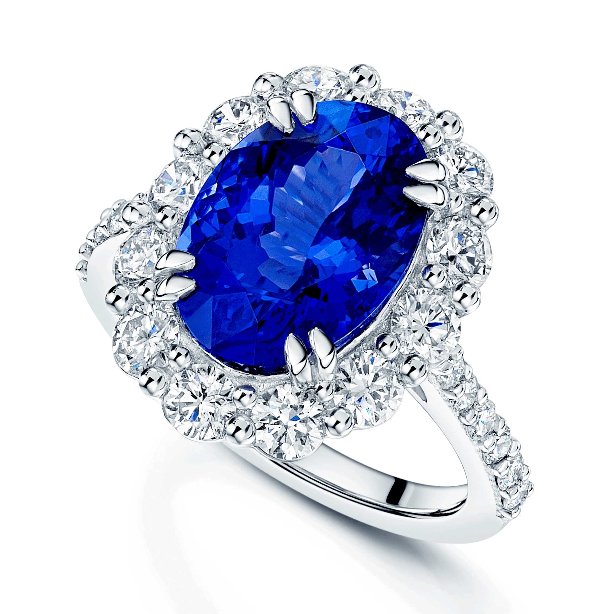 Platinum Oval Claw Set Tanzanite 5.89ct And Diamond Cluster Ring 1.70ct With Diamond Set Shoulders
