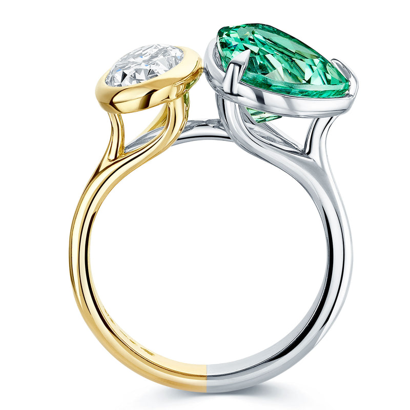 Platinum and 18ct Yellow Gold Trillion Cut Paraiba Tourmaline and Oval Cut Diamond Toi et Moi Dress Ring