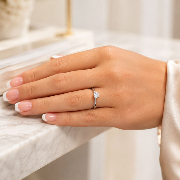 Platinum GIA Certificated Round Brilliant Cut Diamond Ring With A Four Claw Setting