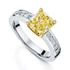 Platinum Cushion Cut Yellow Fancy Diamond Solitaire Ring With Diamond Shoulders