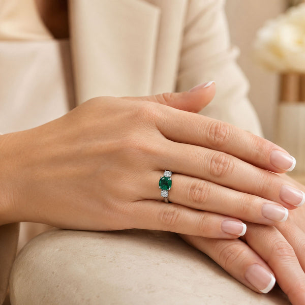 Platinum Cushion Shape Emerald & Diamond Three Stone Ring
