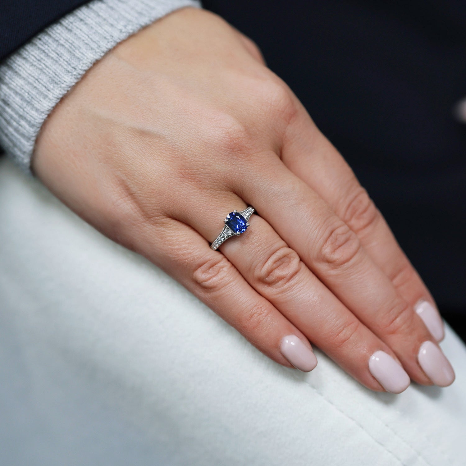 Berry's Platinum Oval Claw Set Sapphire Ring With Bead Edge Grain Set Diamond Shoulders - Berry's Jewellers