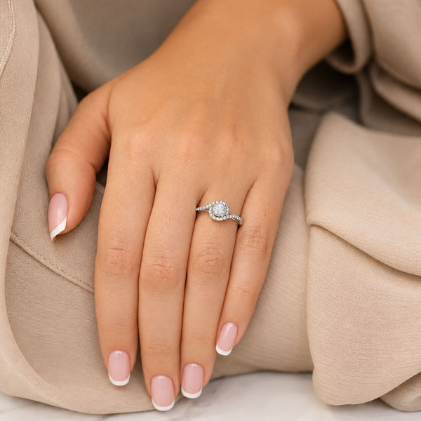 Platinum Round Brilliant Cut Diamond Ring With Wrap Around Diamond Halo