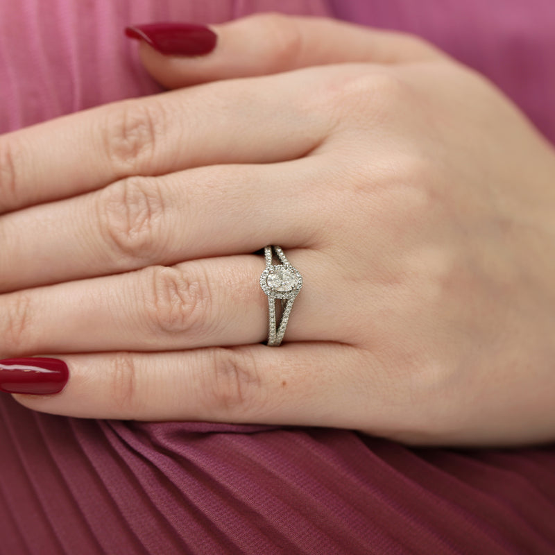 Platinum GIA Certificated Oval Cut Diamond Solitaire Halo Ring With Split Diamond Set Shoulders