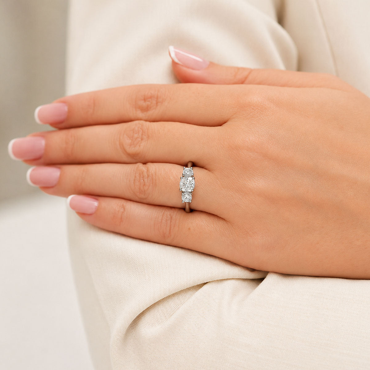 Platinum Cushion & Round Brilliant Cut Diamond Trilogy Ring