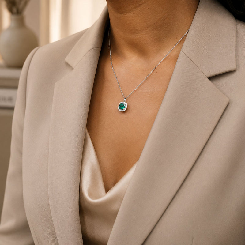 18ct White Gold Cushion Shape Emerald & Diamond Cluster Pendant