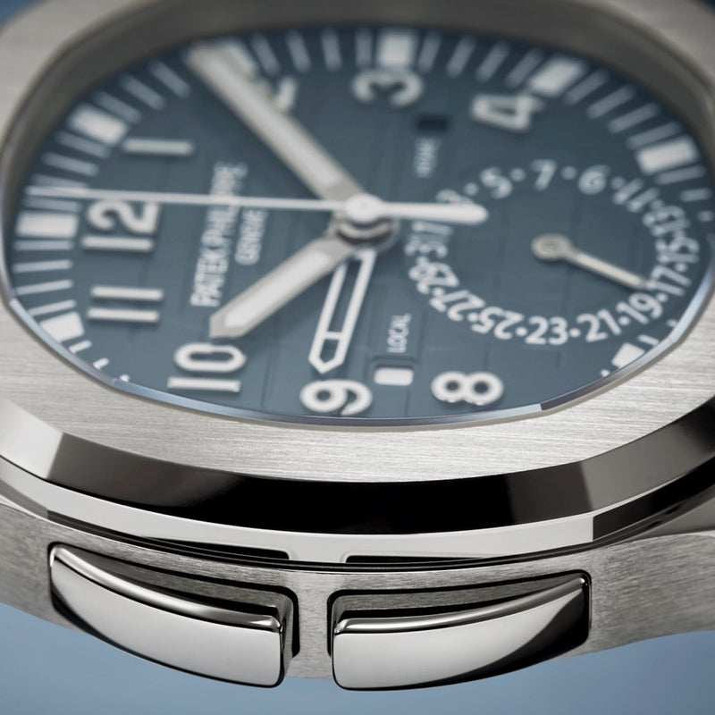 Patek Philippe Aquanaut Travel Time 40.8mm 18ct White Gold Blue Dial Mens Watch - Berry's Jewellers