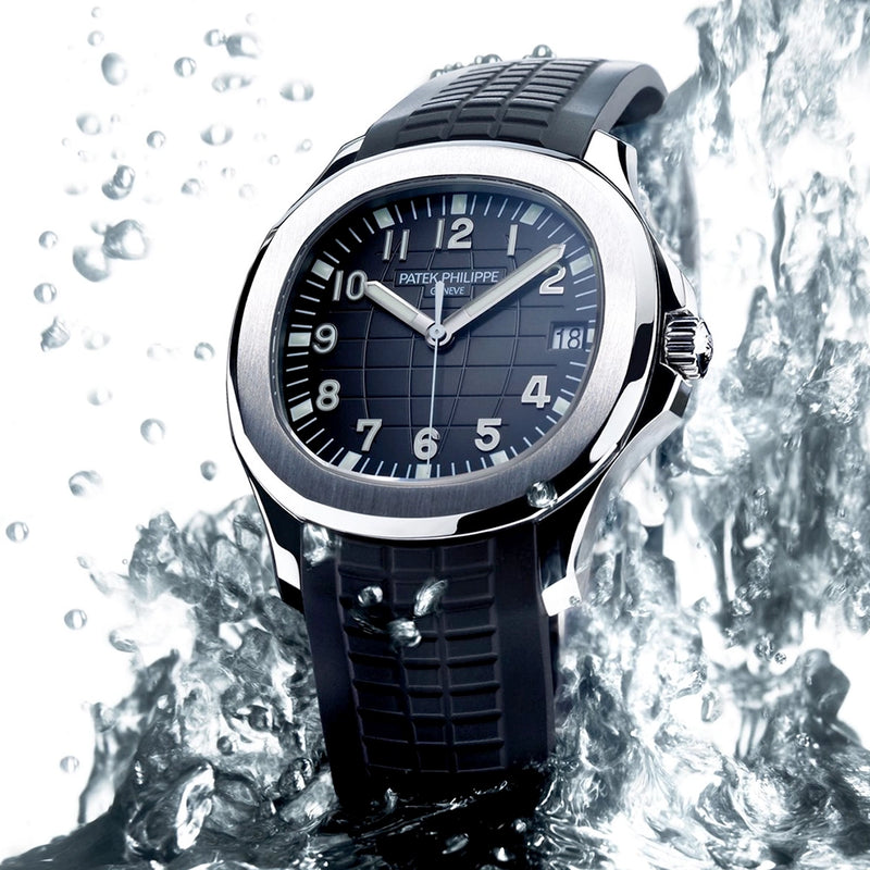 Patek Philippe Aquanaut Date 40.8mm Steel Black Dial Mens Rubber Strap Watch - Berry's Jewellers