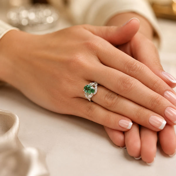 Platinum Oval Cut Green Tourmaline And Marquise And Round Brilliant Diamond Twist Ring