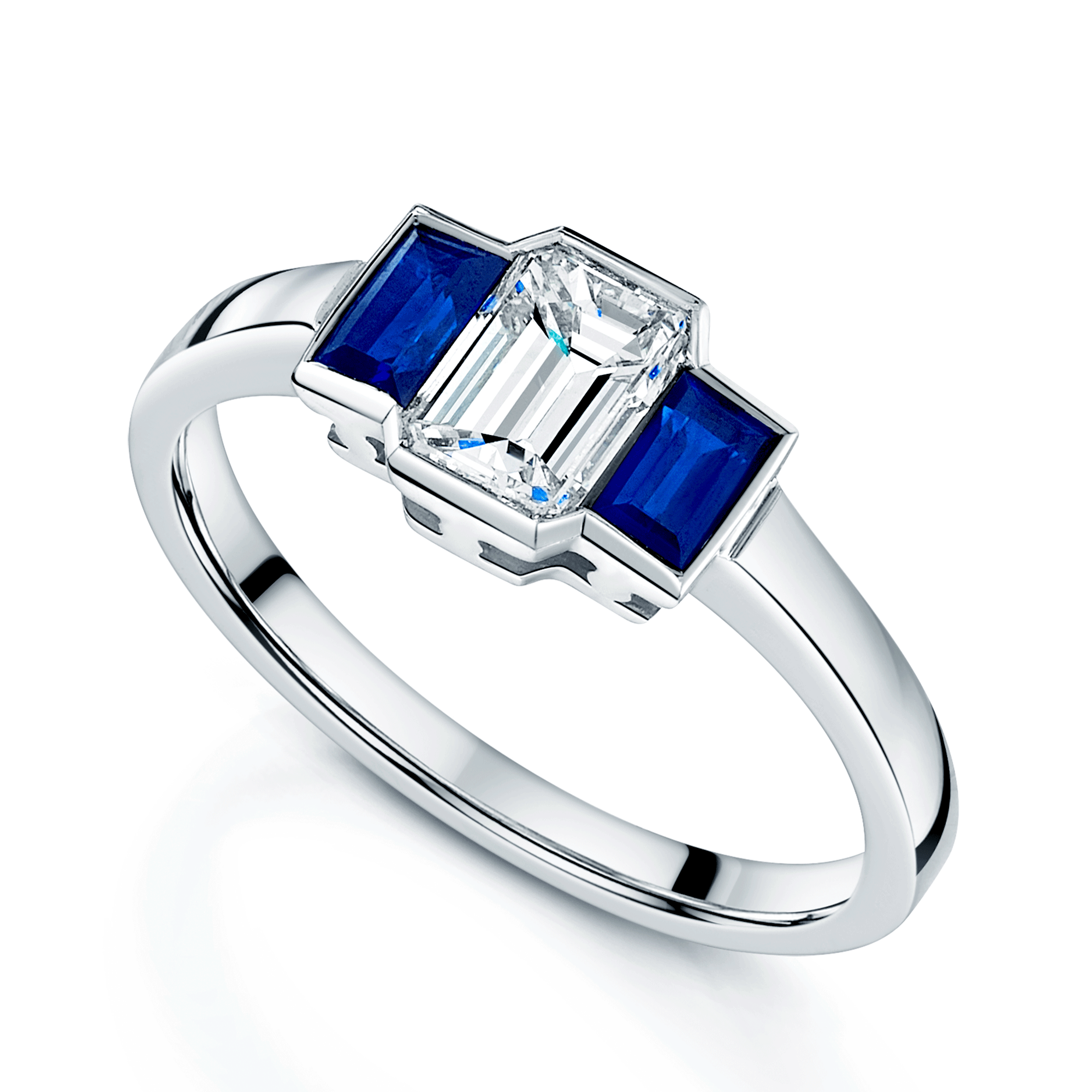 18ct White Gold Emerald Cut Diamond And Sapphire Three Stone Ring
