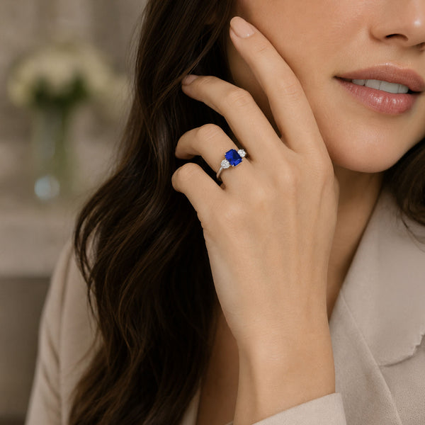 Platinum Rectangular Step Cut Sapphire &  GIA Brilliant Cut Diamond Three Stone Ring