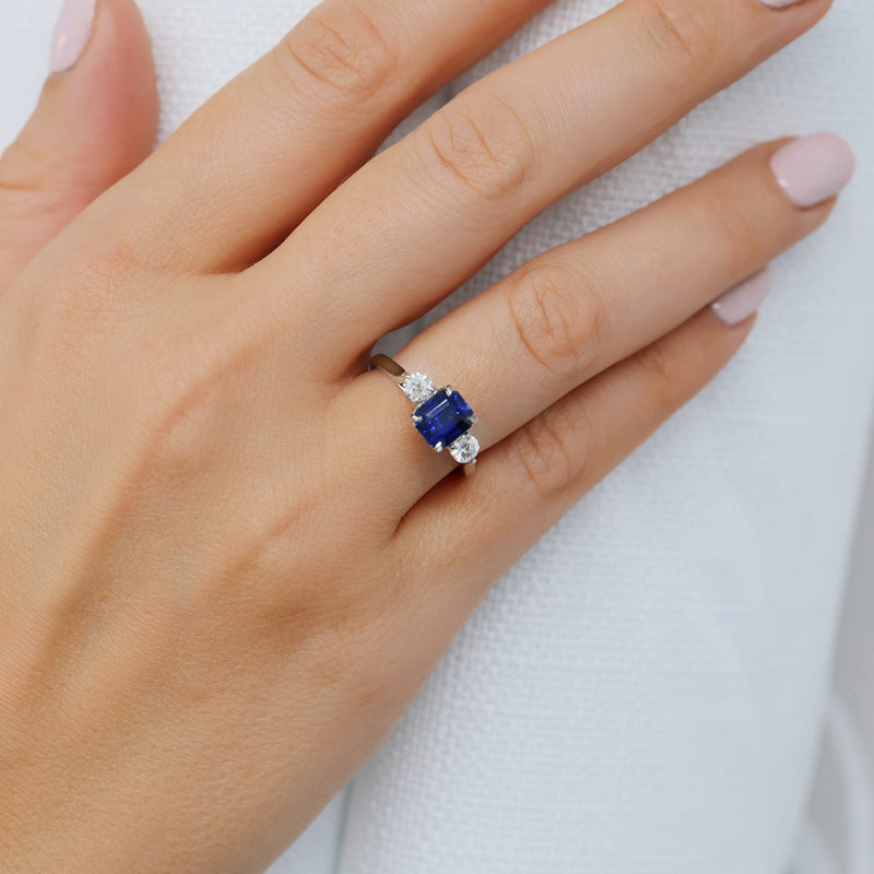 Berry's Platinum Rectangular Step Cut Sapphire & Round Brilliant Cut Diamond Three Stone Ring - Berry's Jewellers