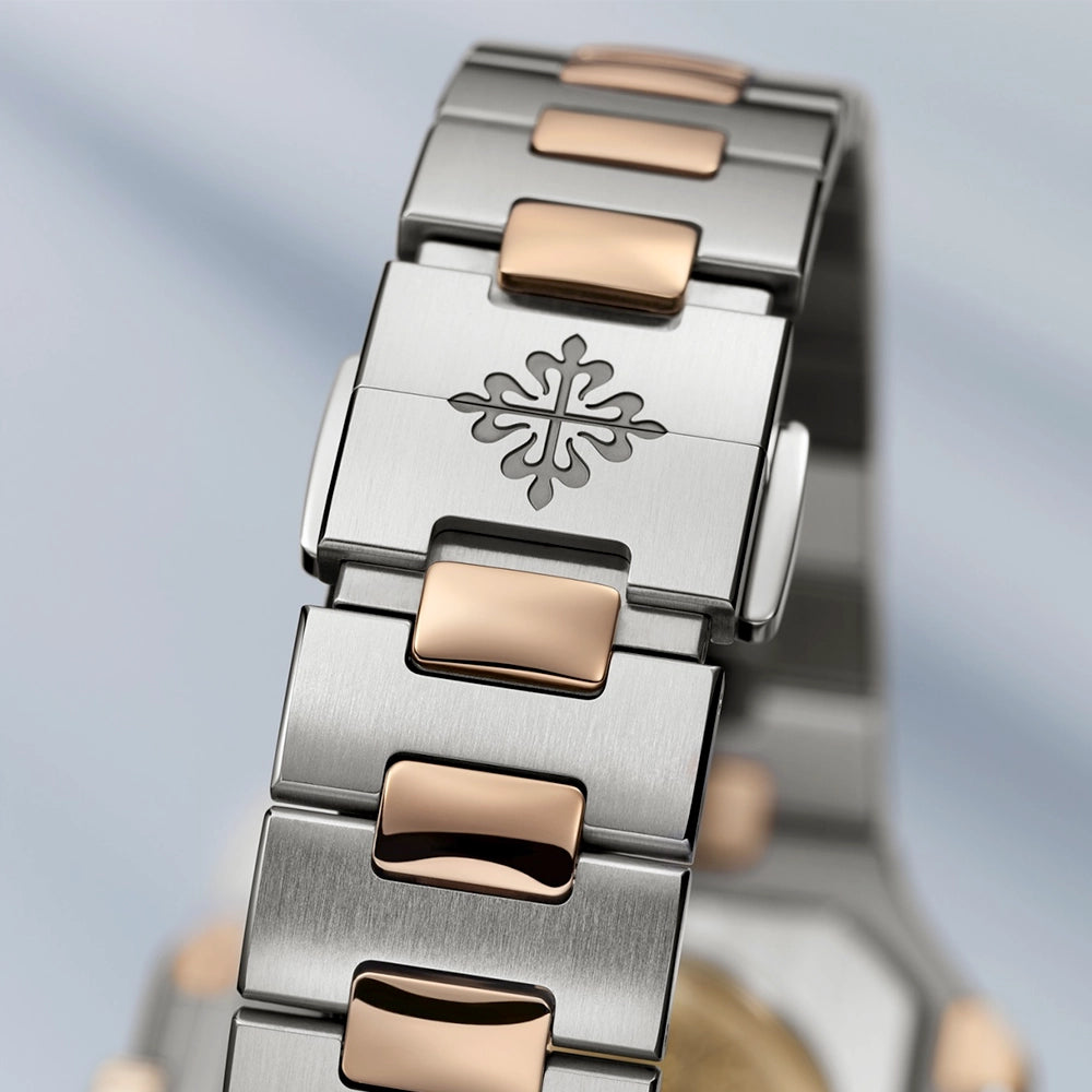 Patek Philippe Cubitus Large 45mm Two-Tone Blue Dial Bracelet Watch - Berry's Jewellers