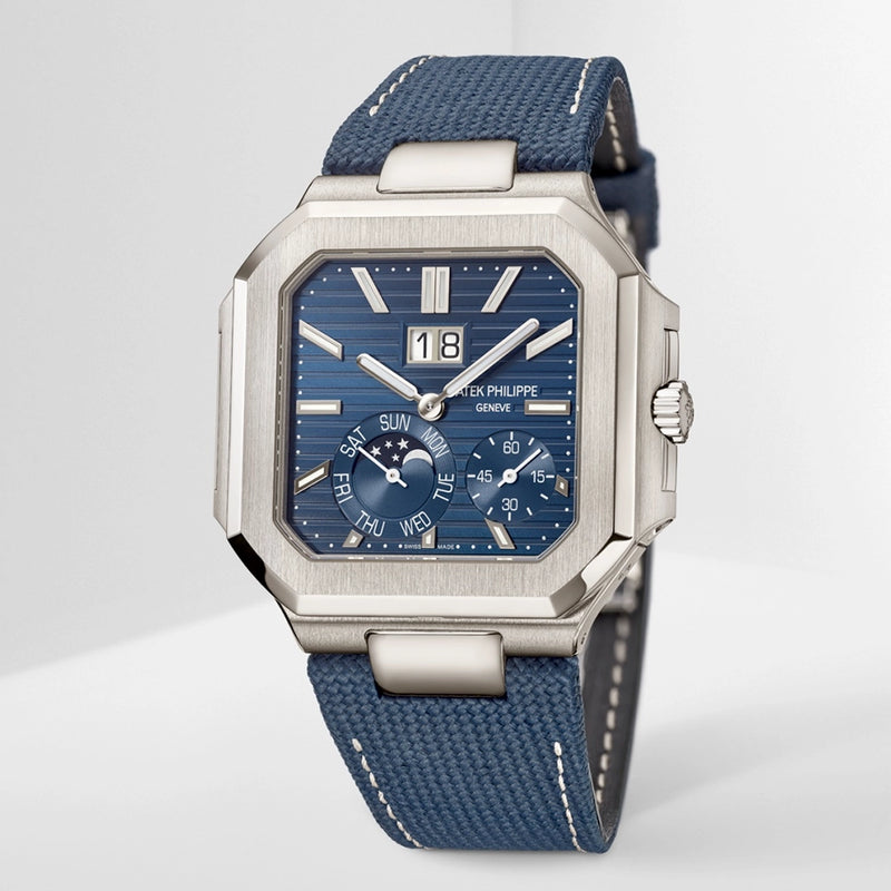 Patek Philippe Cubitus Large 45mm Grand Date Moon Phases Platinum Blue Dial Watch - Berry's Jewellers
