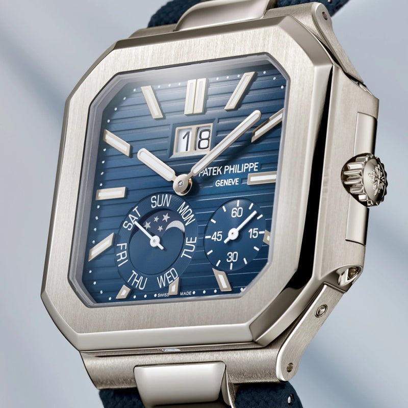 Patek Philippe Cubitus Large 45mm Grand Date Moon Phases Platinum Blue Dial Watch - Berry's Jewellers