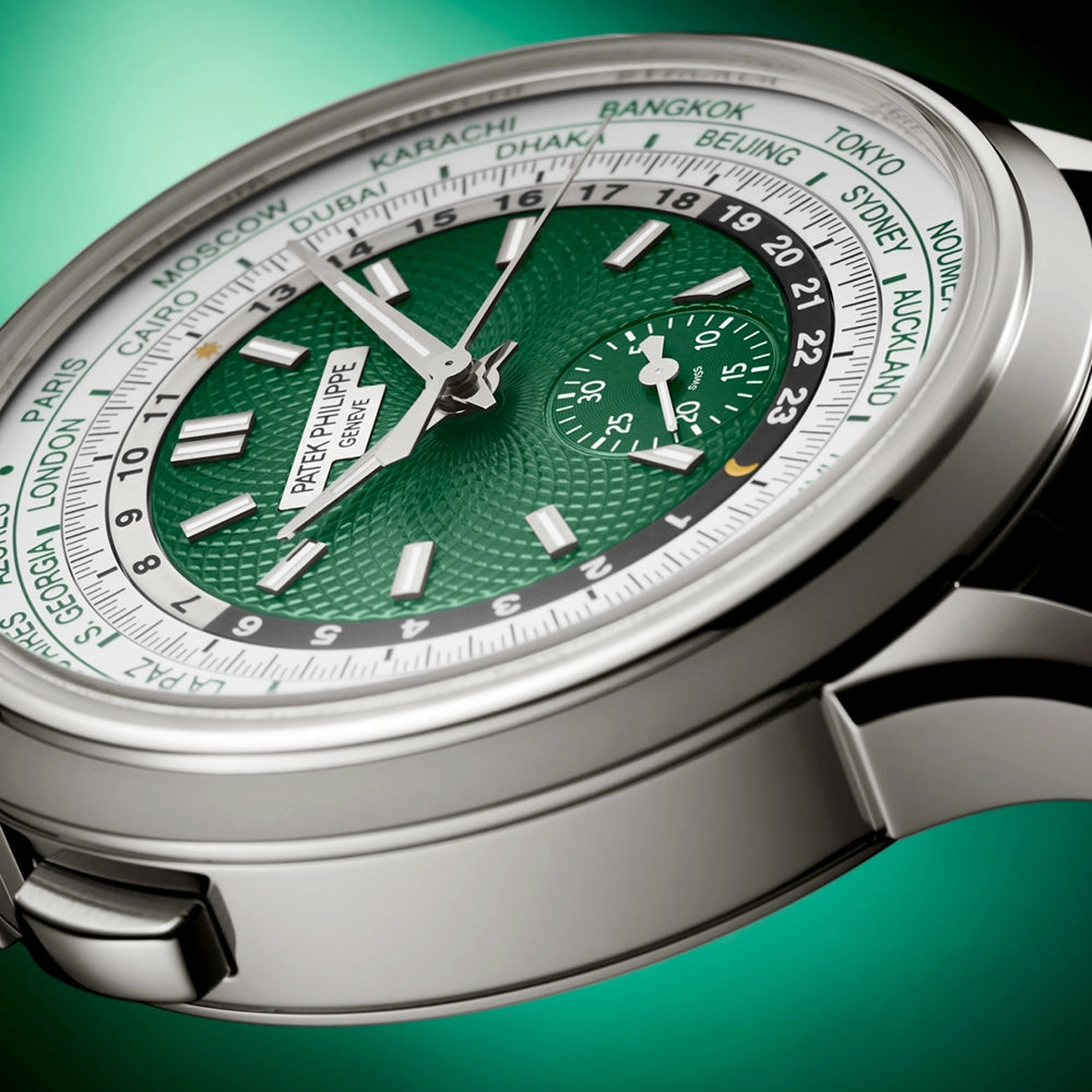 Patek Philippe Complications World Time Flyback Chronograph Platinum Green Dial Watch - Berry's Jewellers