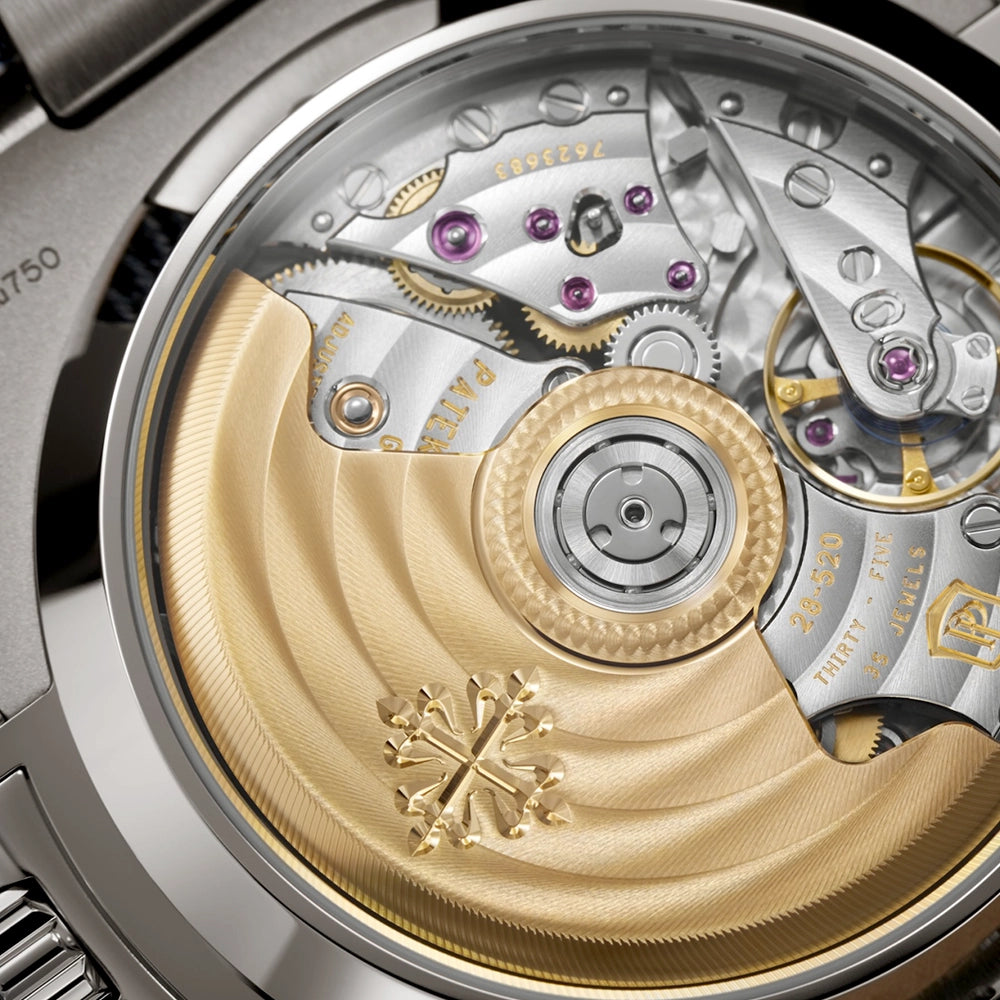 Patek Philippe Nautilus Flyback Chronograph 18ct White Gold Denim Strap Watch - Berry's Jewellers