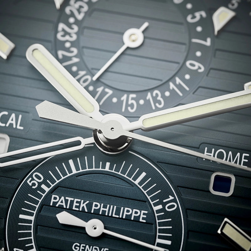 Patek Philippe Nautilus Flyback Chronograph Travel Time Steel Bracelet Watch - Berry's Jewellers