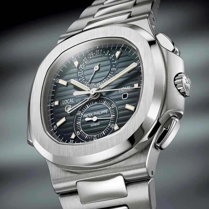 Patek Philippe Nautilus Flyback Chronograph Travel Time Steel Bracelet Watch - Berry's Jewellers