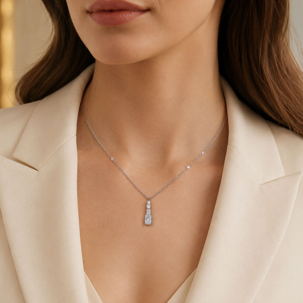 Berry's 18ct White Gold Round Brilliant and Emerald Cut Diamond Four Stone Pendant - Berry's Jewellers