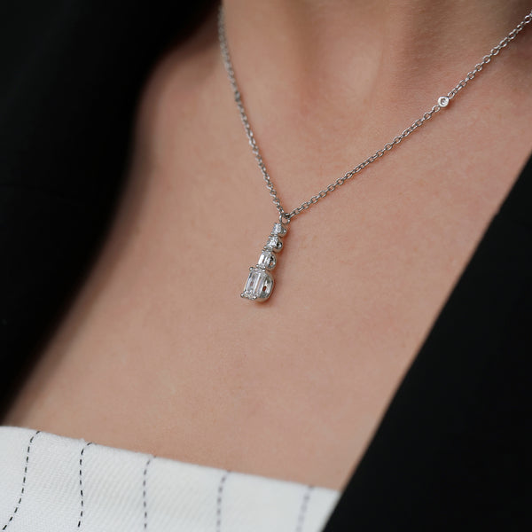 Berry's 18ct White Gold Round Brilliant and Emerald Cut Diamond Four Stone Pendant - Berry's Jewellers