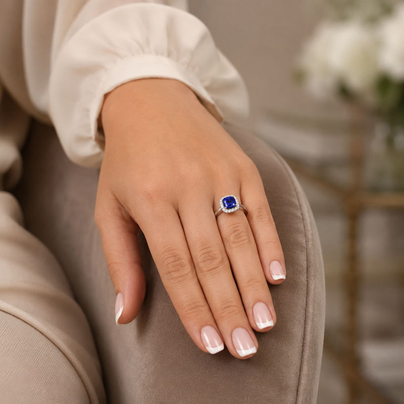 Platinum Cushion Cut Blue Sapphire & Round Brilliant Cut Diamond Halo Ring