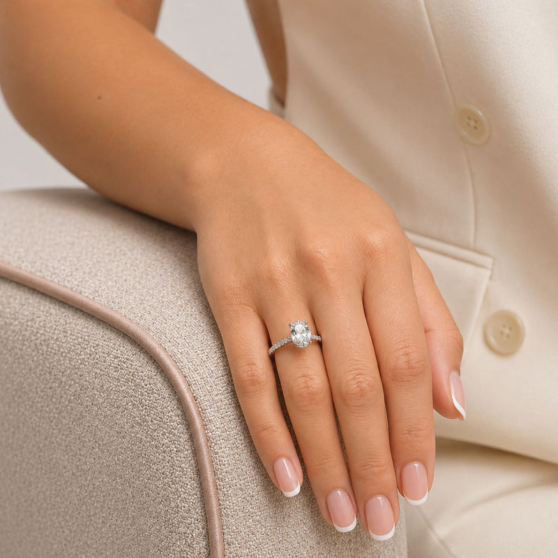 Platinum GIA Certificated 2.05 Carat Oval Cut Diamond Solitaire Ring With Diamond Shoulders