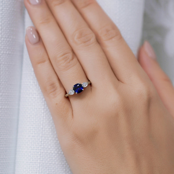 Berry's Platinum Cushion Cut Blue Sapphire & Pear Cut Diamond Three Stone Ring - Berry's Jewellers