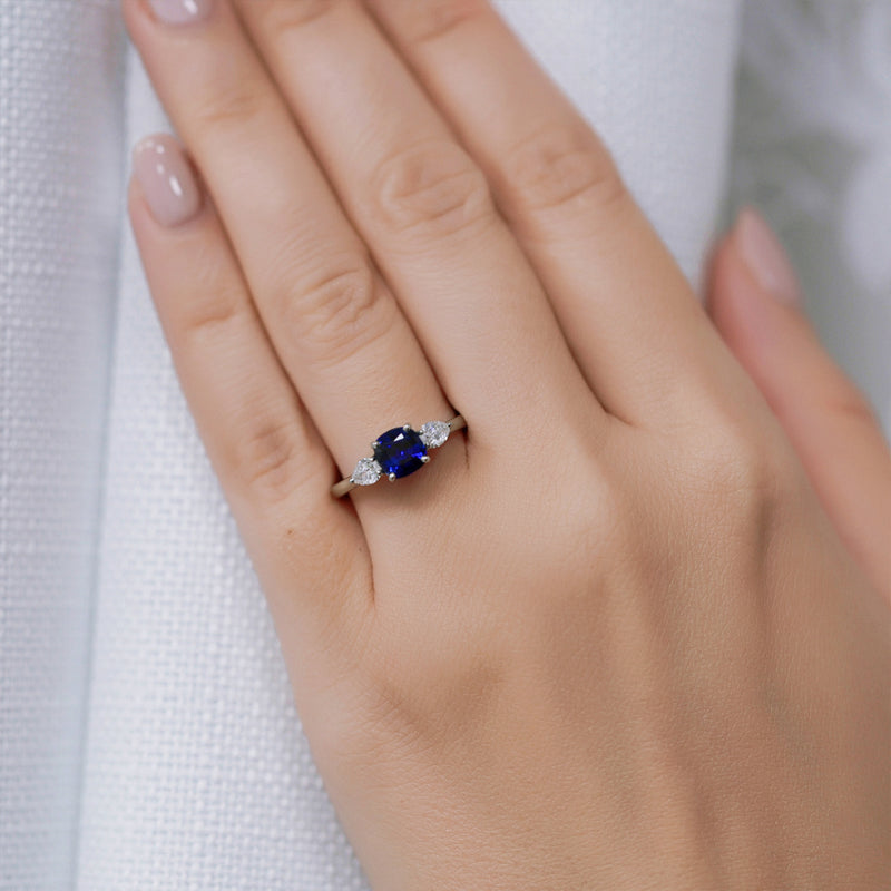 Berry's Platinum Cushion Cut Blue Sapphire & Pear Cut Diamond Three Stone Ring - Berry's Jewellers