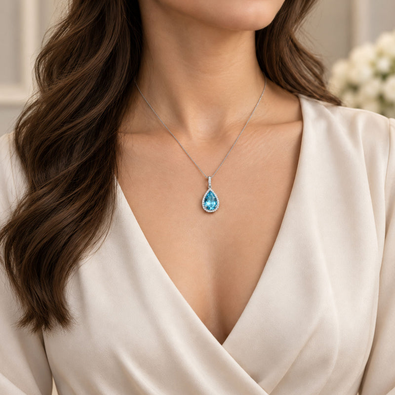 18ct White Gold Aquamarine And Diamond Pendant With A Diamond Bale
