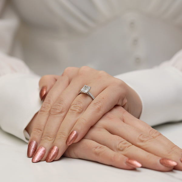 Platinum Radiant Cut Diamond Single Stone Ring With Diamond Shoulders