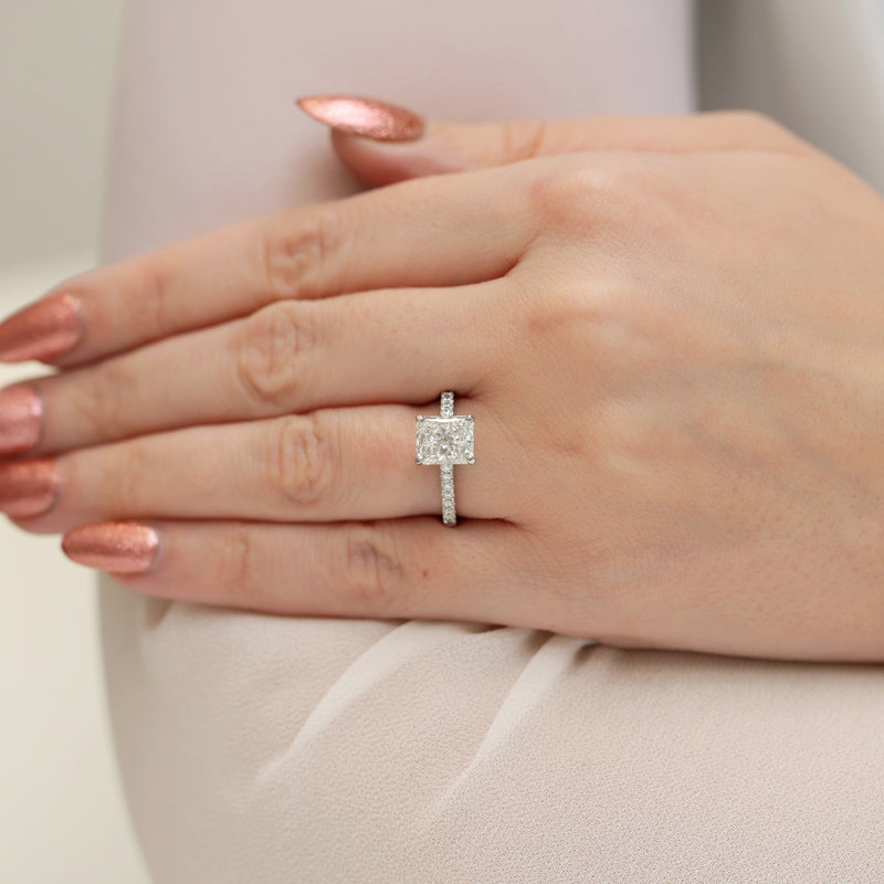 Platinum Radiant Cut Diamond Single Stone Ring With Diamond Shoulders