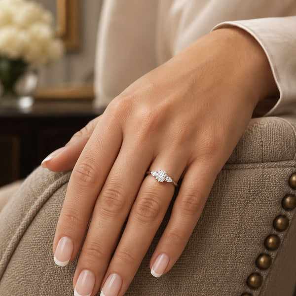 Platinum Oval & Pear Cut Diamond Three Stone Ring