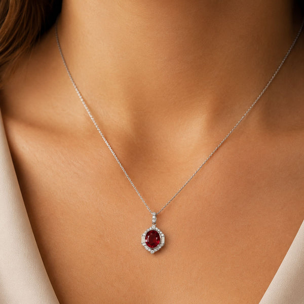 18ct White Gold Oval Cut Ruby And Diamond Art Deco Style Halo Pendant