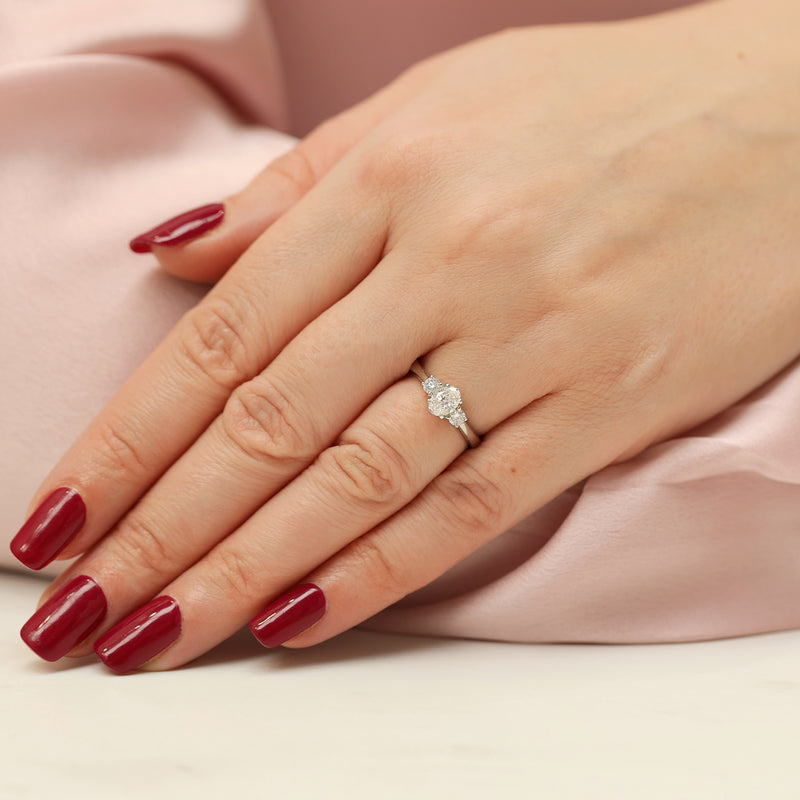 Platinum Oval & Round Brilliant Cut Diamond Three Stone Ring