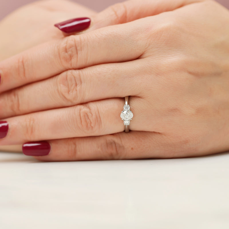 Platinum Oval & Round Brilliant Cut Diamond Three Stone Ring