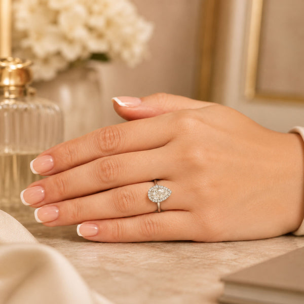 Platinum GIA Certificated Pear Cut Diamond Engagement Ring With Halo Surround
