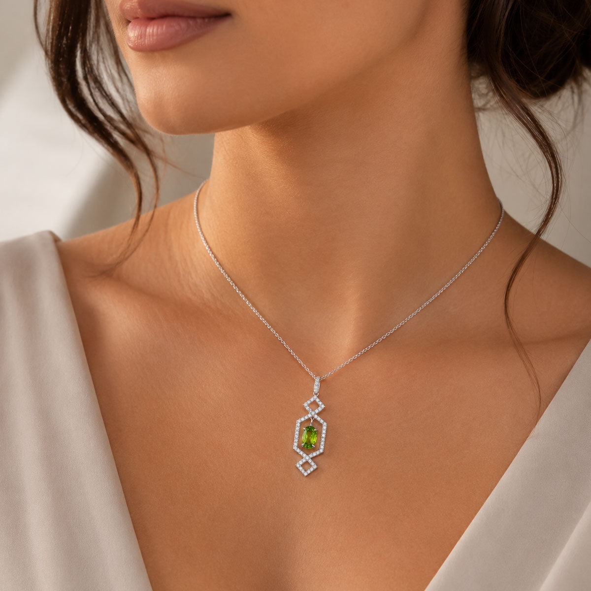 Berry's 18ct White Gold Oval Cut Tsavorite Garnet And Diamond Art Deco Style Frame Pendant - Berry's Jewellers