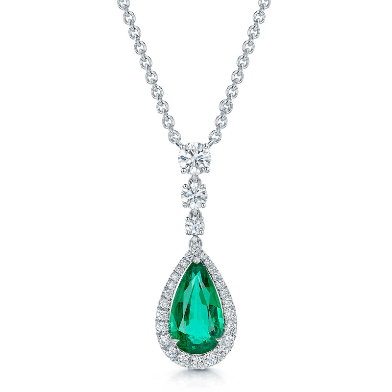 18ct White Gold Pear Cut Emerald And Diamond Graduated Halo Pendant