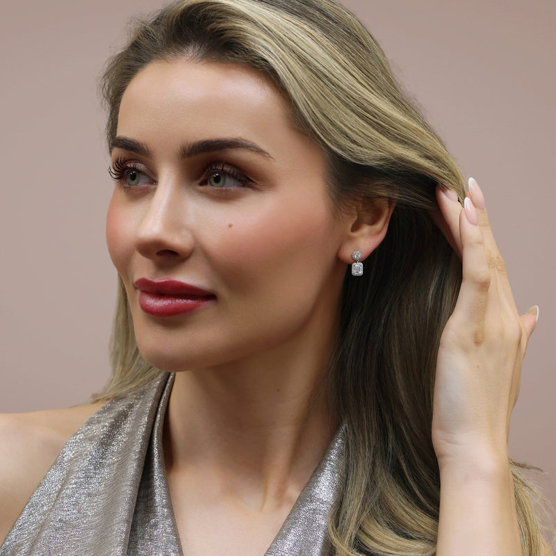 18ct White Gold GIA Certificated Emerald Cut And Round Brilliant Cut Diamond Halo Drop Earrings