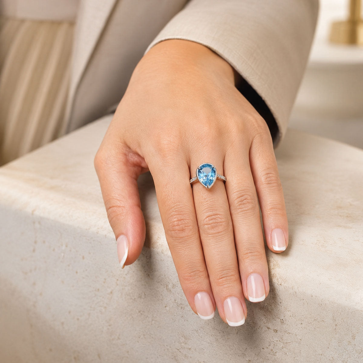 Platinum Pear Cut Aquamarine Ring With Diamond Set Shoulders
