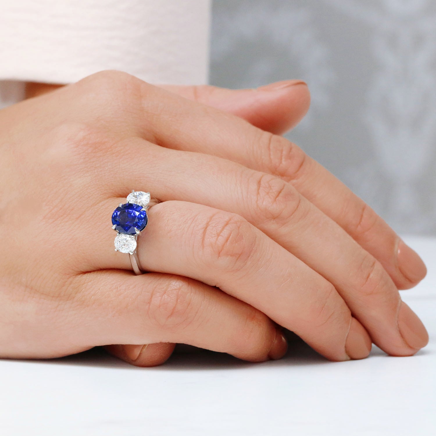 Berry's Platinum Certificated Oval Cut Blue Sapphire And Oval Cut Diamond Three Stone Ring - Berry's Jewellers