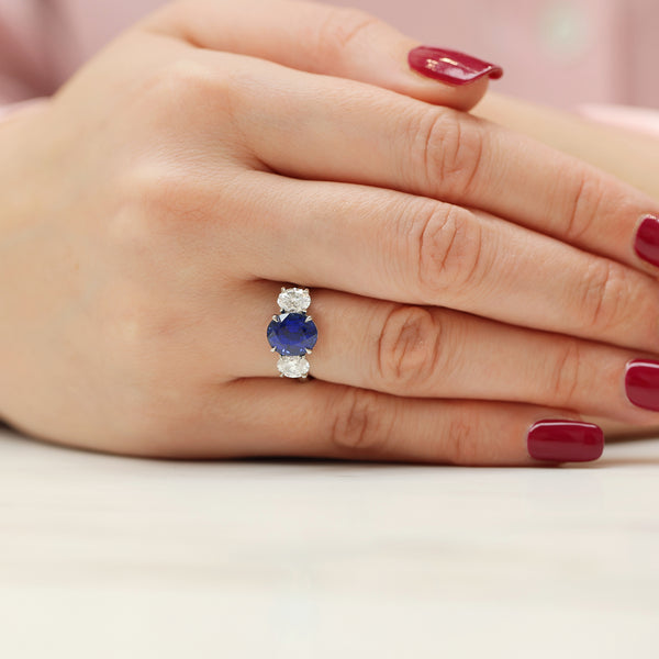 Platinum Certificated Oval Cut Blue Sapphire And Oval Cut Diamond Three Stone Ring