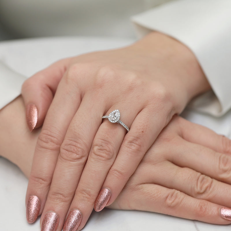 Platinum GIA Certificated Pear cut Diamond Halo Ring With Diamond Set Shoulders