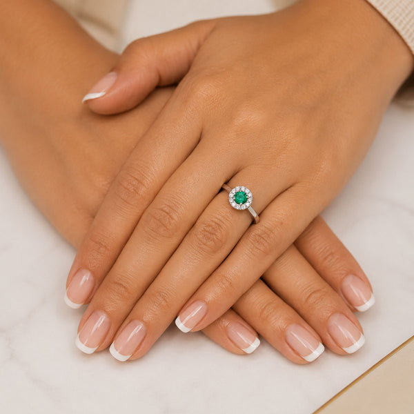 Platinum Emerald And Diamond Halo Surround Dress Ring