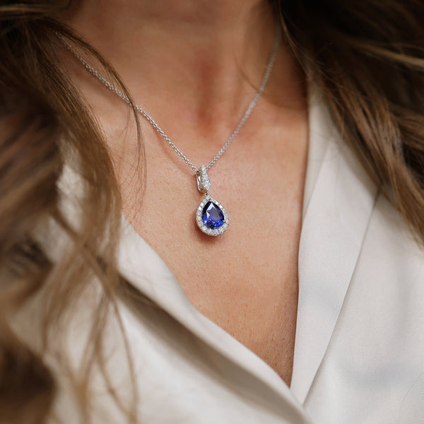 Berry's 18ct White Gold Pear Cut Sapphire And Diamond Halo Pendant - Berry's Jewellers