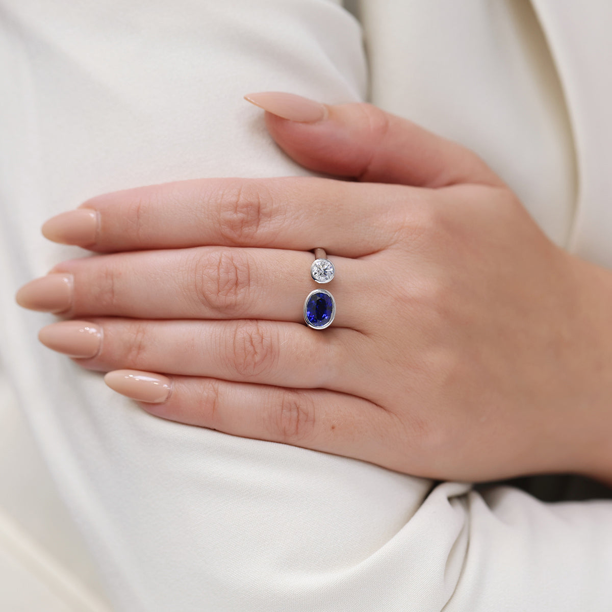 Berry's Platinum Toi Et Moi Oval Cut Sapphire And Round Brilliant Diamond Two Stone Rub Over Set Ring - Berry's Jewellers