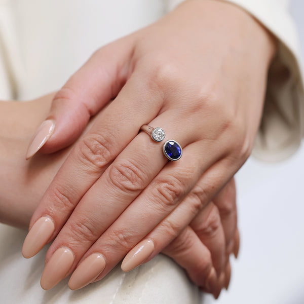 Berry's Platinum Toi Et Moi Oval Cut Sapphire And Round Brilliant Diamond Two Stone Rub Over Set Ring - Berry's Jewellers