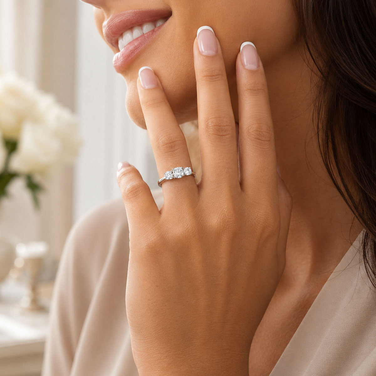 Platinum & Cushion Cut Diamond Three Stone Ring